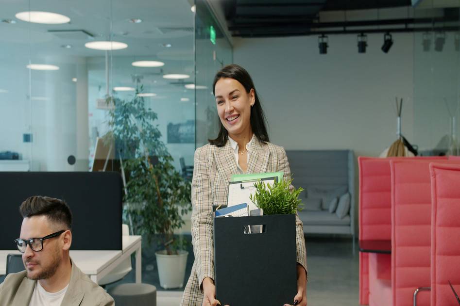 Career coach guiding a professional through transition planning