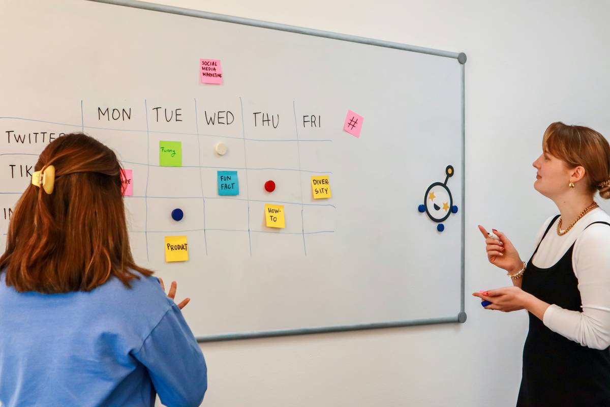 transition and transformation coach guiding client through career change roadmap on whiteboard