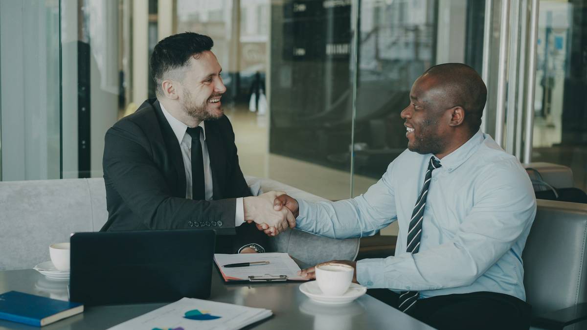 professional career coaching service quality demonstrated through side-by-side resume comparison showing before-and-after edits by a certified coach